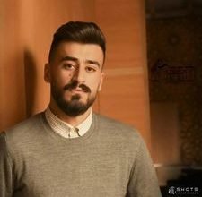 صورة الدكتور غيث هلال موهبة متفردة بالرسم الواقعي التصويري