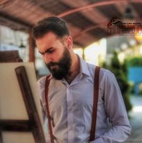 صورة علي باسل مصطفى فنان تشكيلي يبحر بين الإبداع والإنجاز تخليداً لاسمه